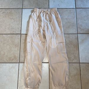 Tan high waisted cargo pants with pockets